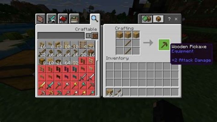 How do you make a pickaxe in minecraft?