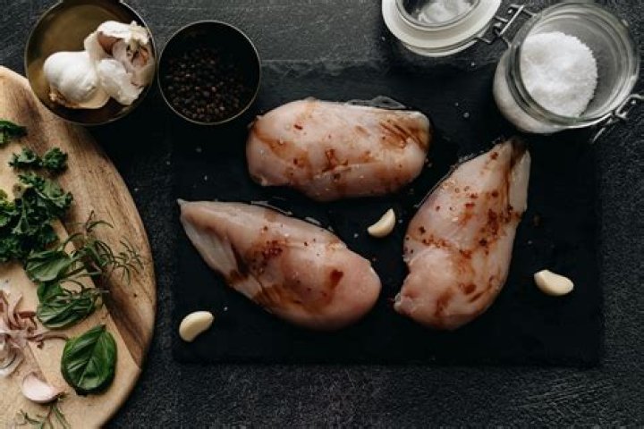Should marinated chicken be kept in fridge or freezer?