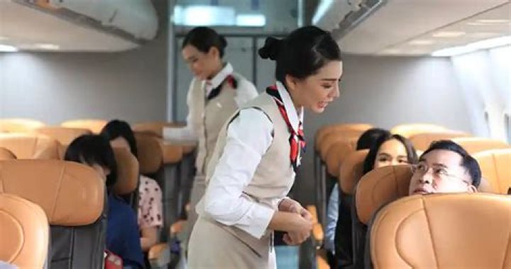 Who is an air hostess?