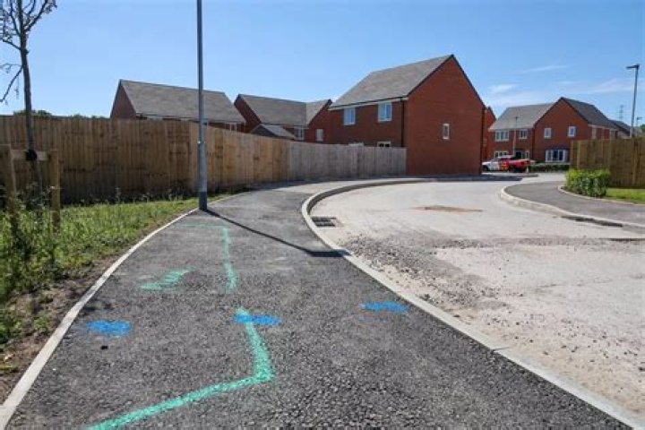 Who repairs unadopted roads?