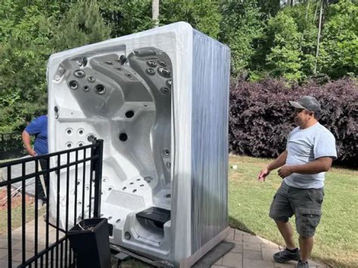 Who to move a hot tub?