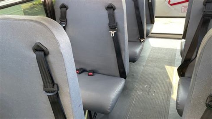 Why don't buses have seat belts?