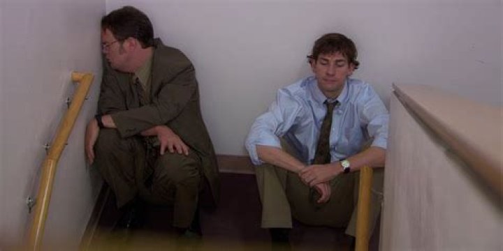 Why was dwight crying in the stairwell?