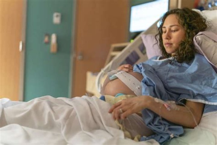 Would a warm bath induce labor?