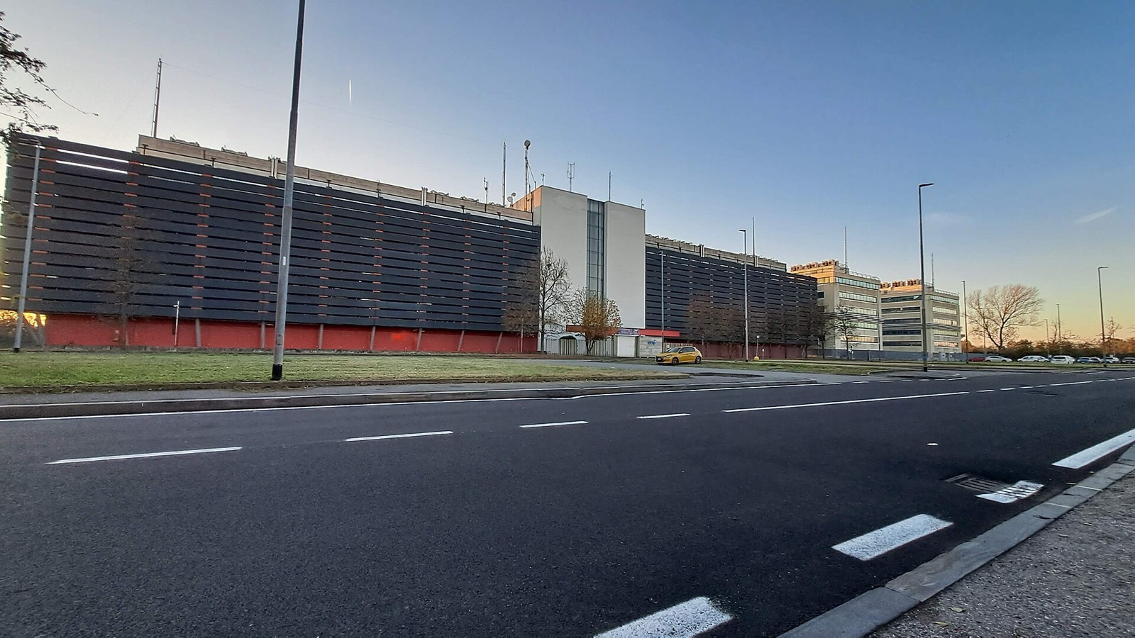 Exterior of the BT Italia facility in Settimo Milanese, Italy, viewed from across the road.